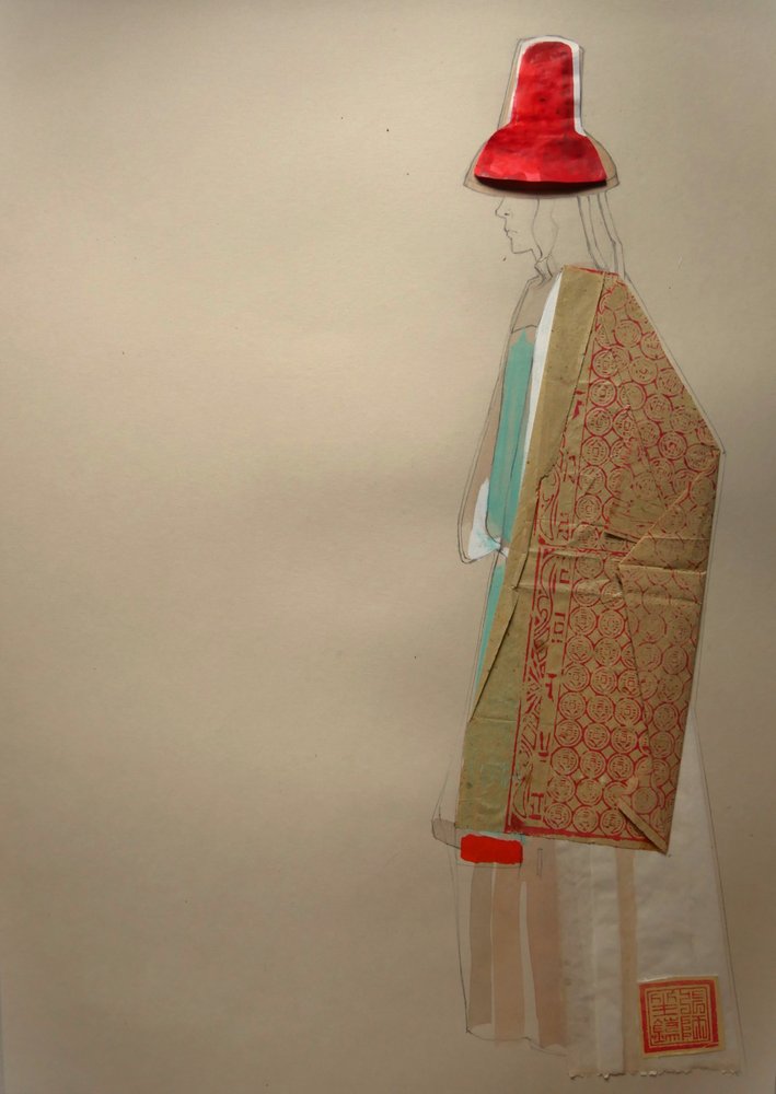 Elegant figur med rød hatt av Doris Schmitz