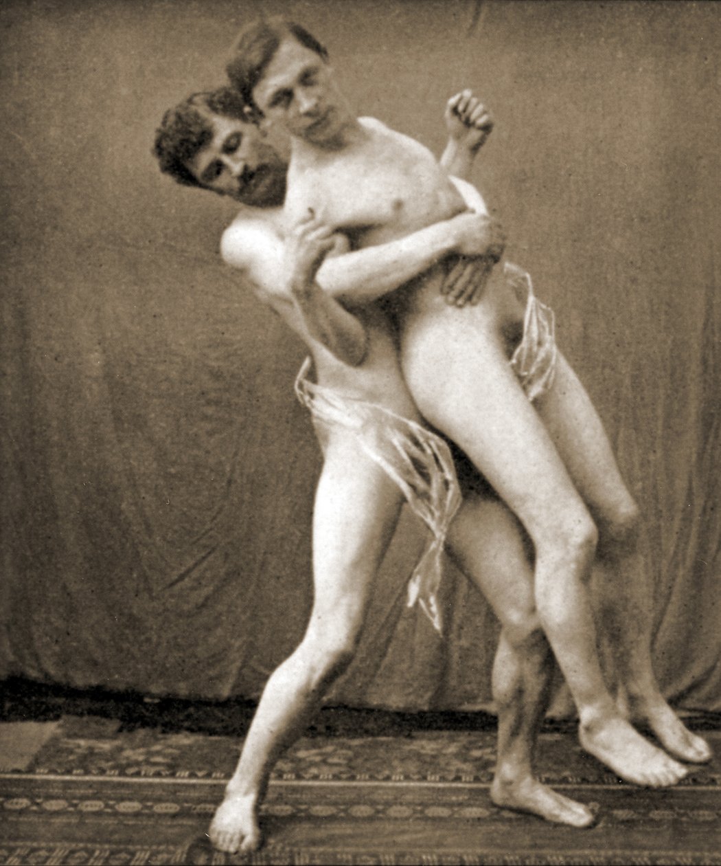 Brytere demonstrerer midjegrepet, ca. 1910 (sepia-bilde) av Unknown