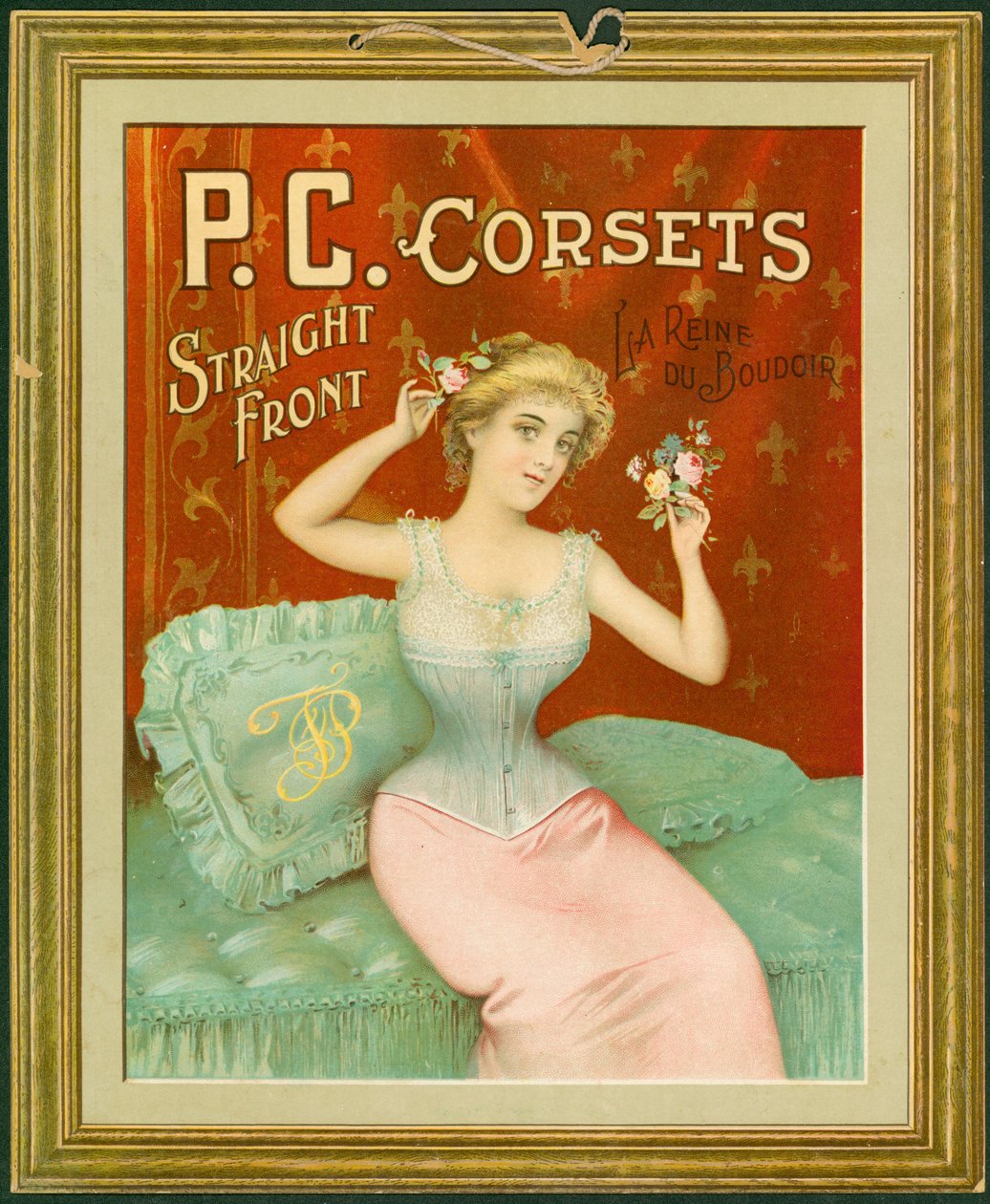 P.C. Korsetter, rett foran, La Reine Du Boudoir (fargelitho på kort med hengende snor) av American School