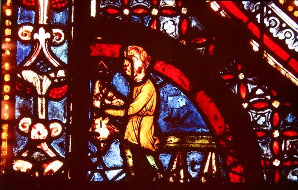 En slakter, detalj fra nedre venstre hjørne av Miracles of the Virgin-vinduet i den sørlige midtgangen i skipet, 1205-15 av French School