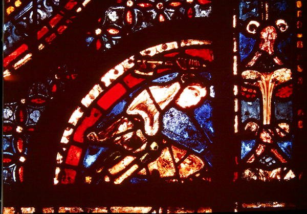 En slakter, detalj fra nedre høyre hjørne av Miracles of the Virgin-vinduet i den sørlige midtgangen i skipet, 1205-15 av French School