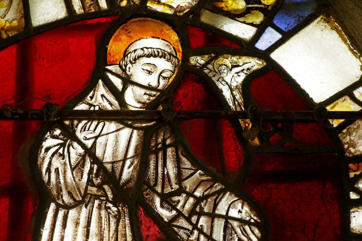 Vindu som viser Saint Francis som en ung munk som har en visjon om Kristus av French School