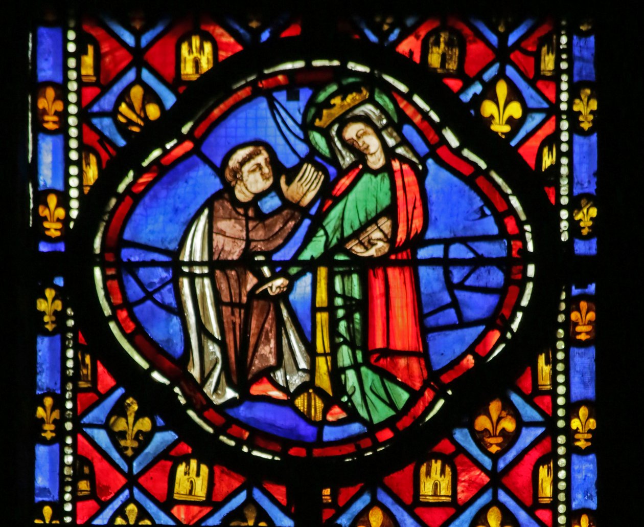 Vindu som viser jomfru Maria av French School