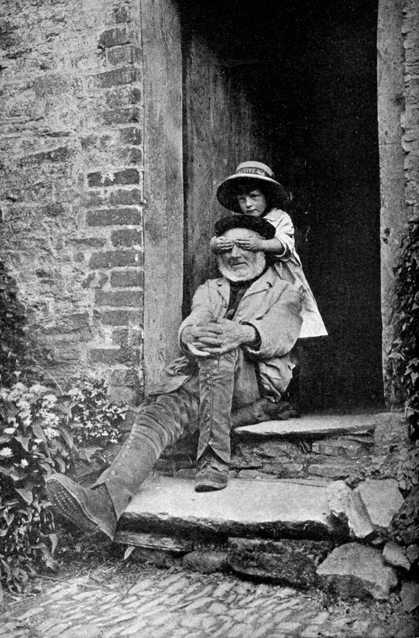 Et barn med sin bestefar, England, c1922. av A. W. Cutler