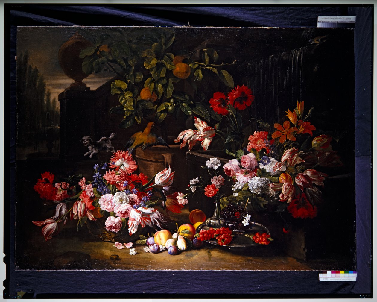 Stilleben med blomster i en hage av Abraham Brueghel