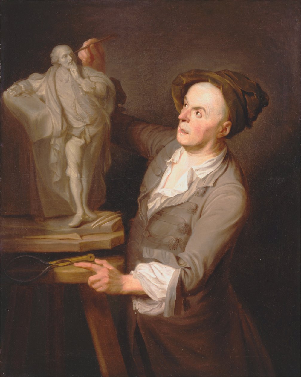 Louis-Francois Roubiliac modellerer sitt monument til Shakespeare av Adrien Carpentiers