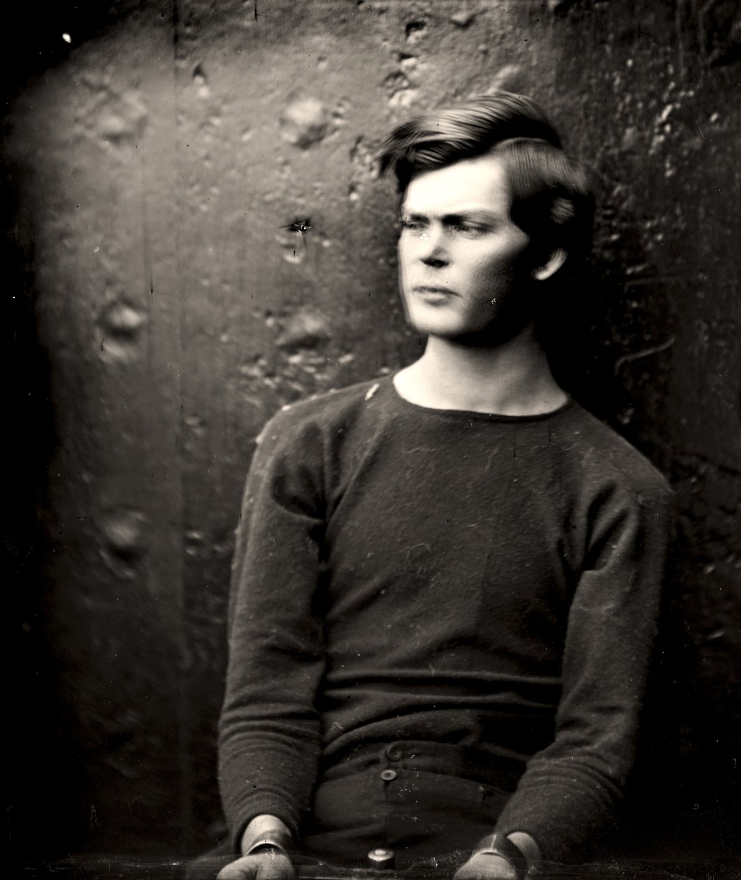 Lewis Powell i håndleddsjern ombord på USS Saugus, 1865 av Alexander Gardner