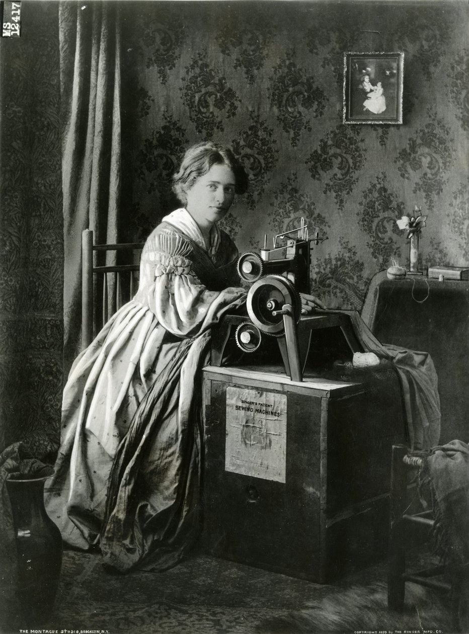 Annonse for Singers patentsymaskiner, 1899 av American Photographer