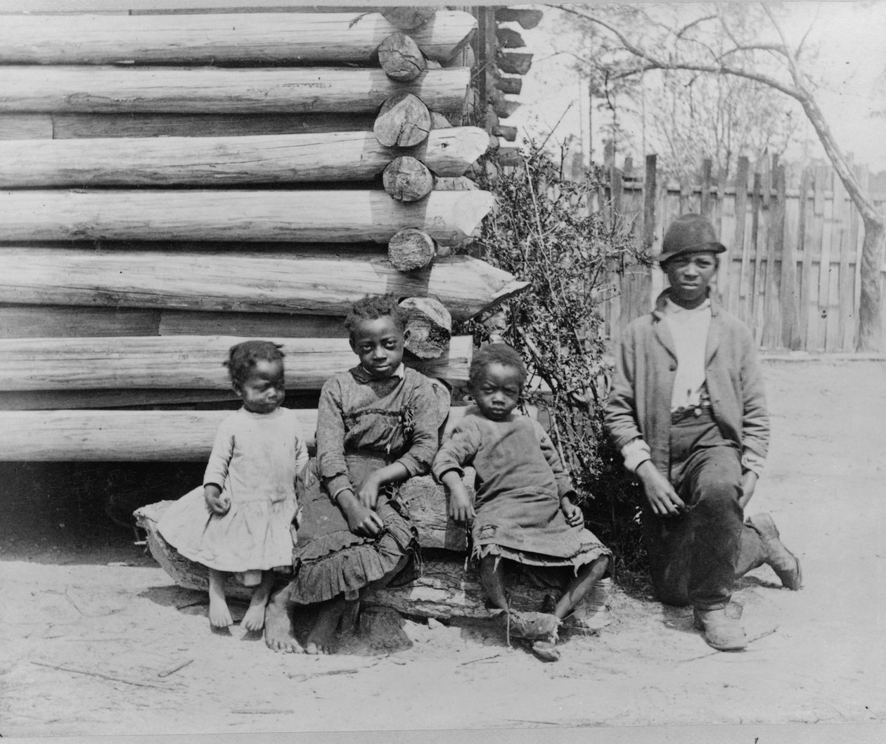 Afroamerikansk mann med barn nær Thomasville, Georgia av American Photographer