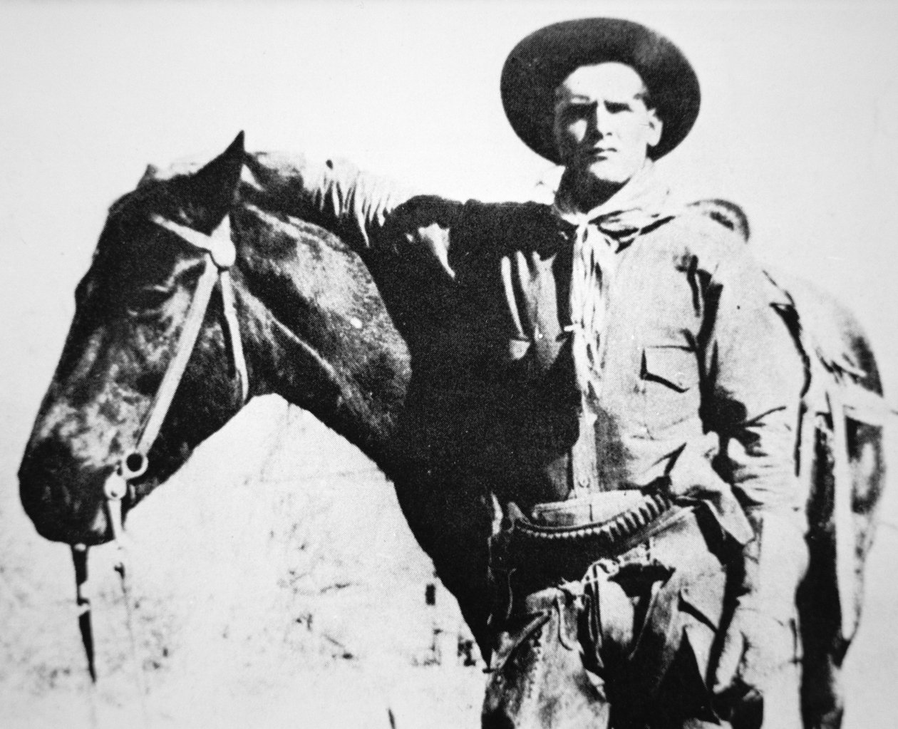 Butch Cassidy (1866-1908/09) med hesten sin (s/hv-bilde) av American Photographer