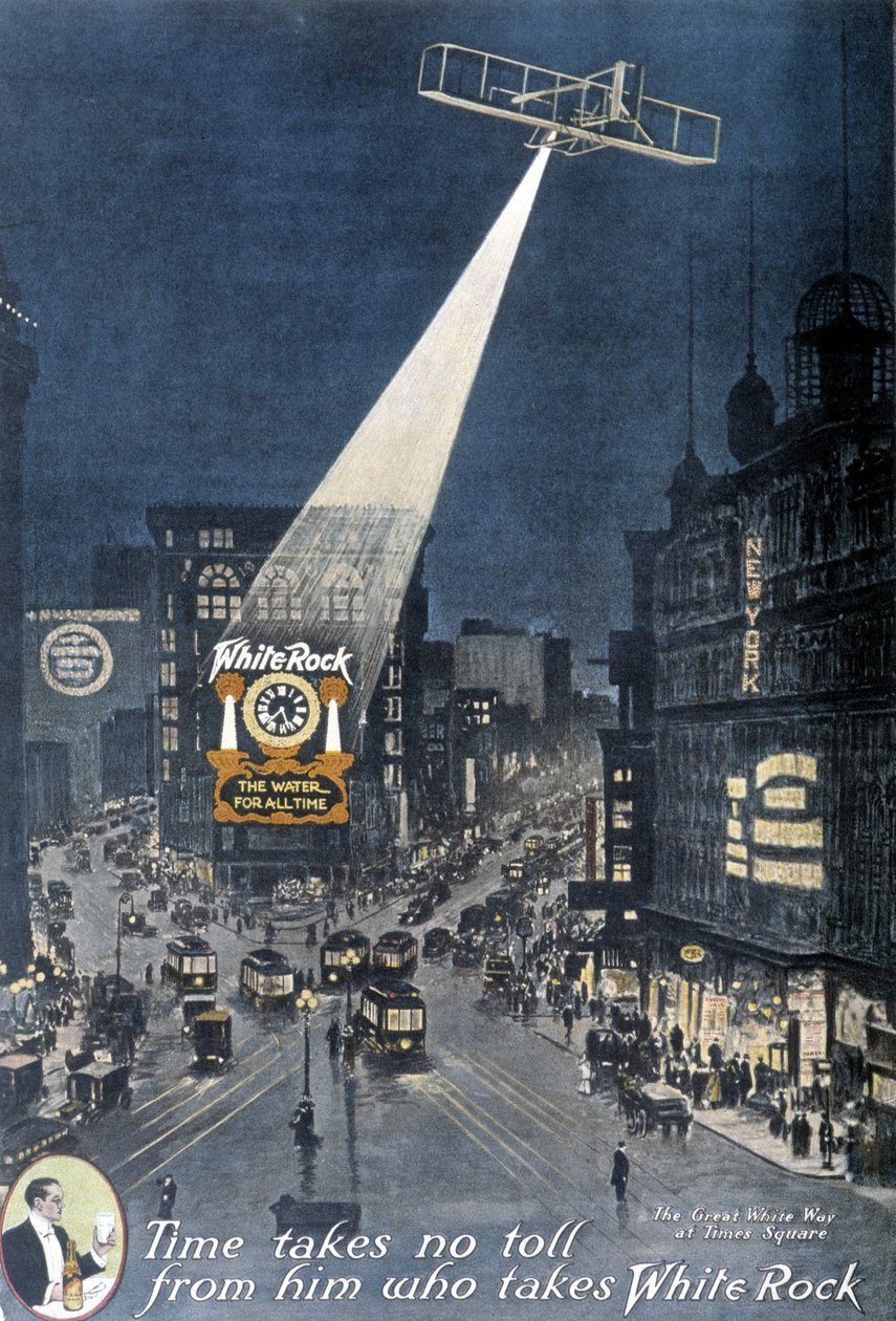 Alkoholreklame "" White Rock"": Et fly som lyser opp "White Rock"-plakaten som henger på en bygning på Times Square i New York. 1912. av American School