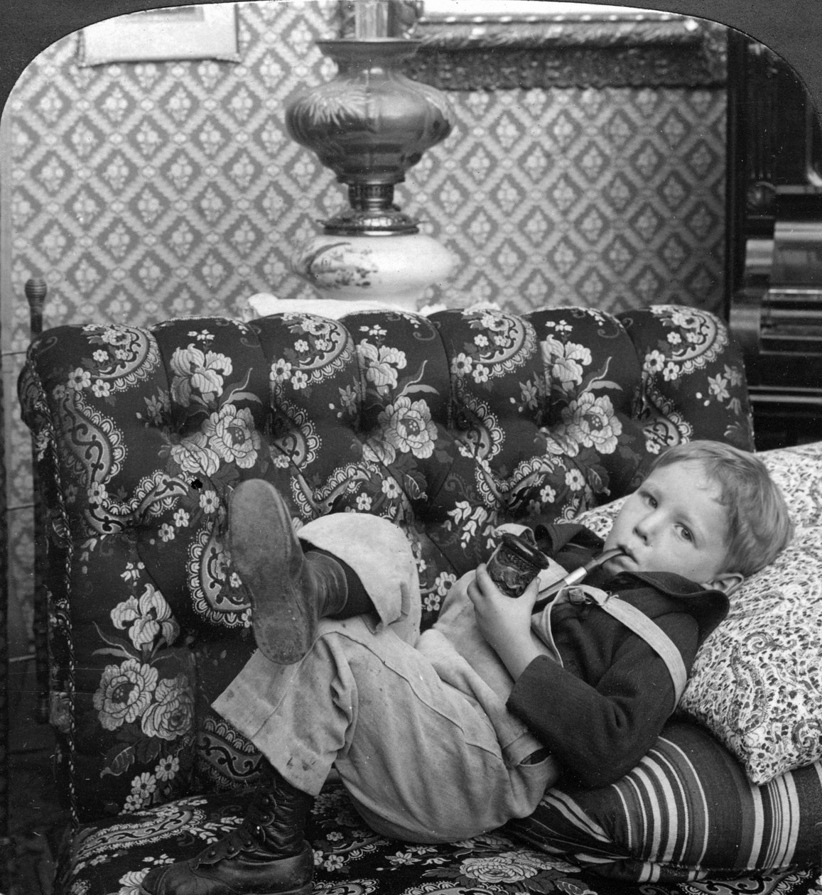 Akkurat som pappa. av American Stereoscopic Company