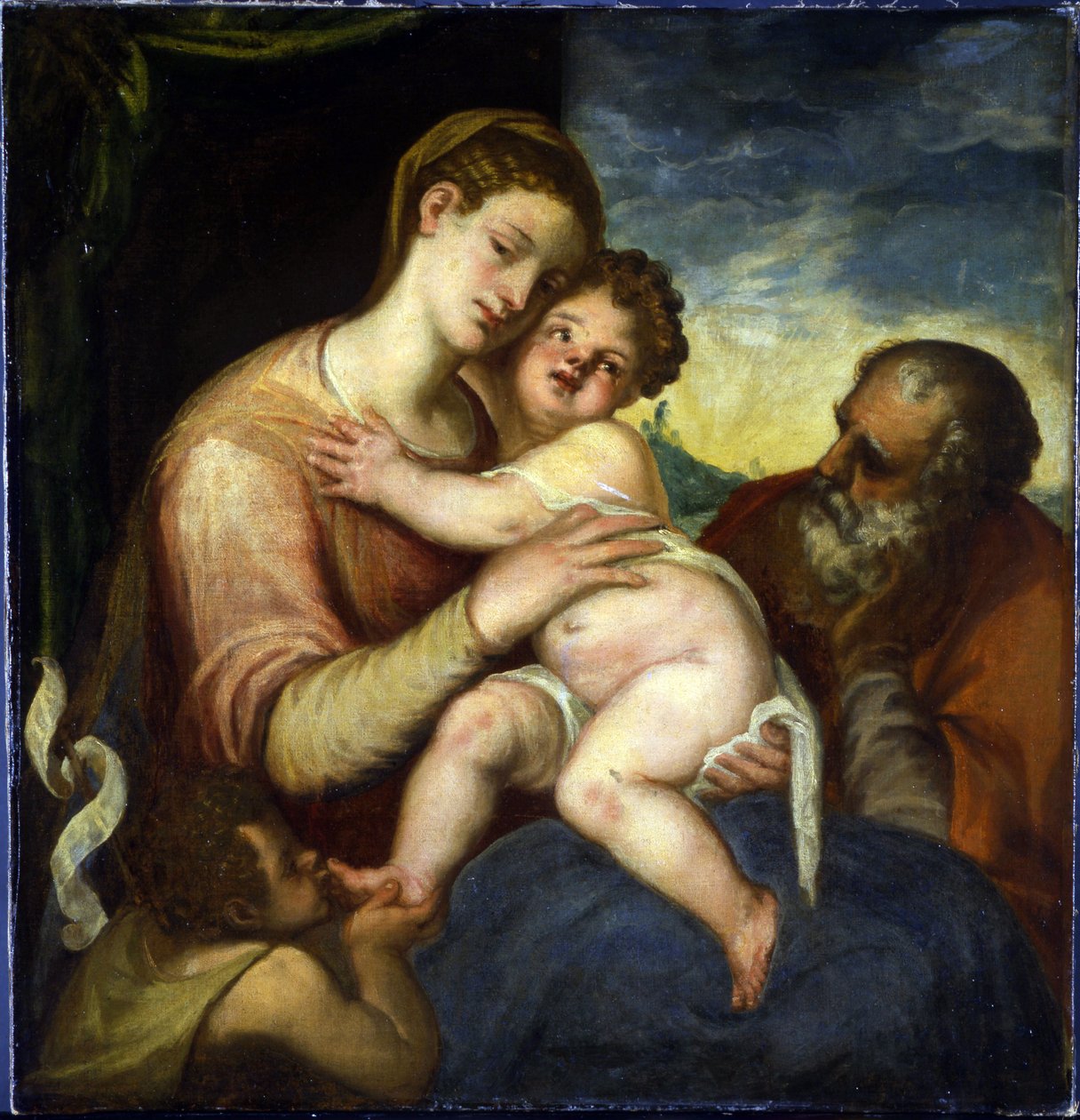 Den hellige familie med døperen Johannes par Schiavone, Andrea (ca. 1520-1582). Olje på lerret, størrelse: 98x93, , Praha slott av Andrea Schiavone