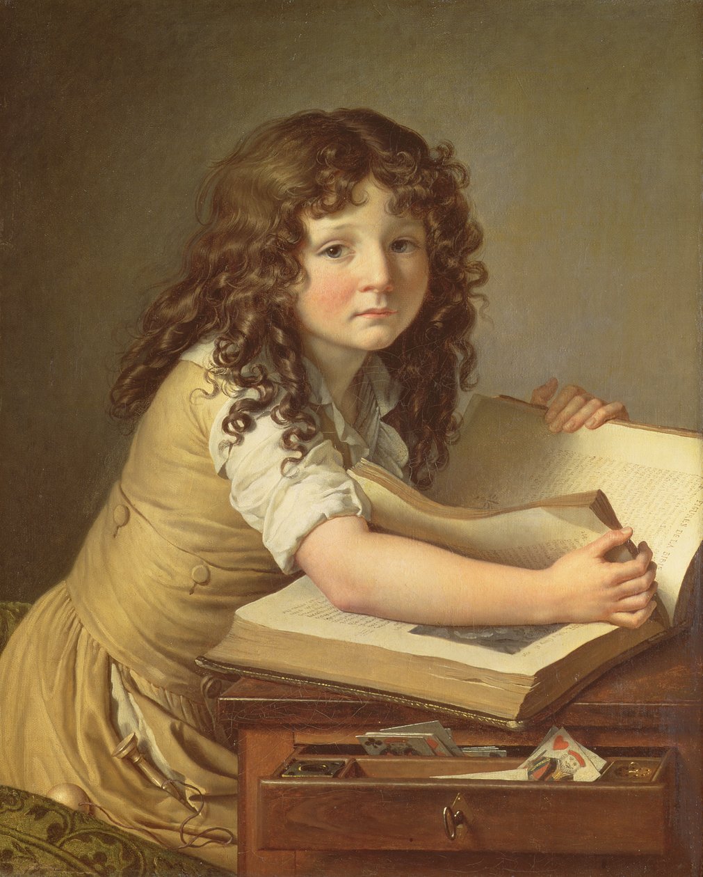 Et barn ser på bilder i en bok av Anne Louis Girodet de Roucy Trioson