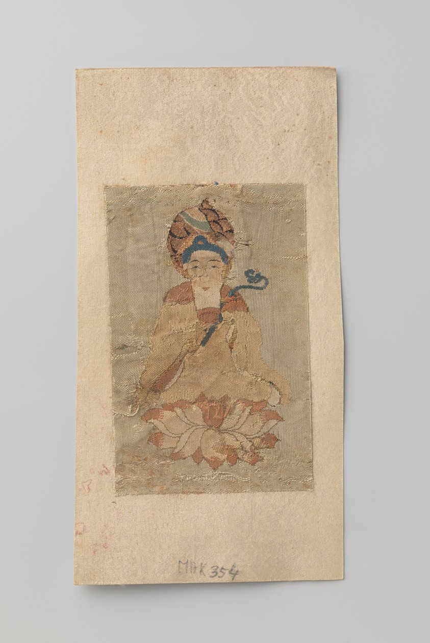 Buddha med ruyi i hånden, sittende på en lotus av Anonymous