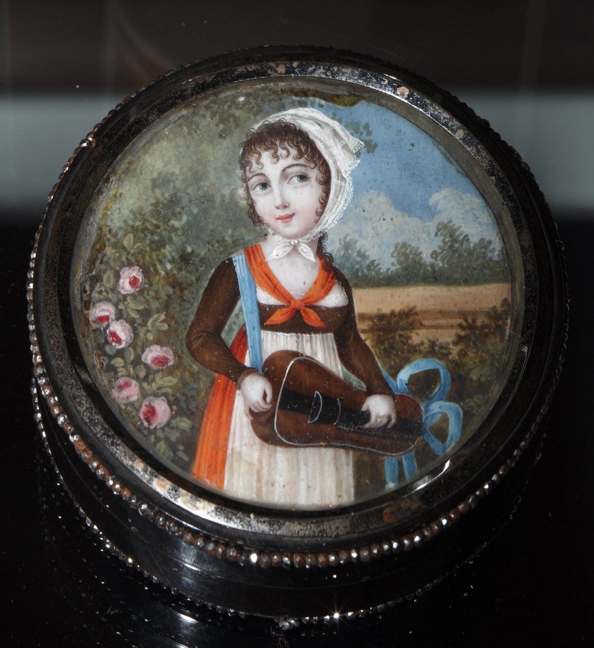 ""Portrait of a Girl with a Hurdy Gurdy"" (Portrait of a Girl With Hurdy Gurdy) Anonym akvarell ca. 1800 Privat samling av Anonymous Anonymous