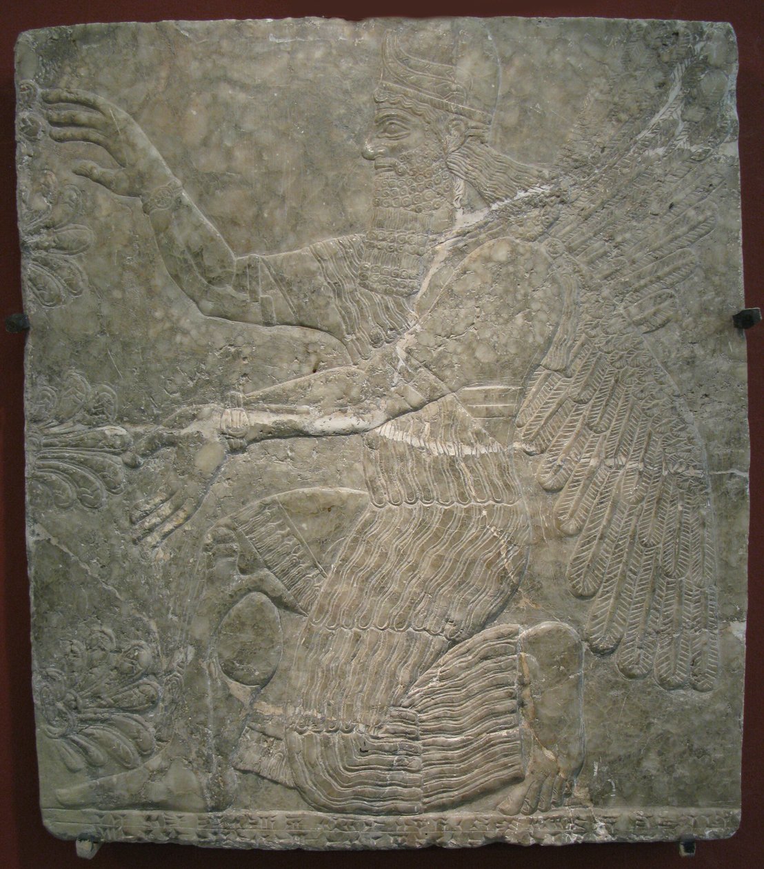 Bevinget guddom ved det hellige treet. Relieff fra palasset til Ashurnasirpal II i Kalhu, Nimrud, 900-tallet f.Kr. av Assyrian