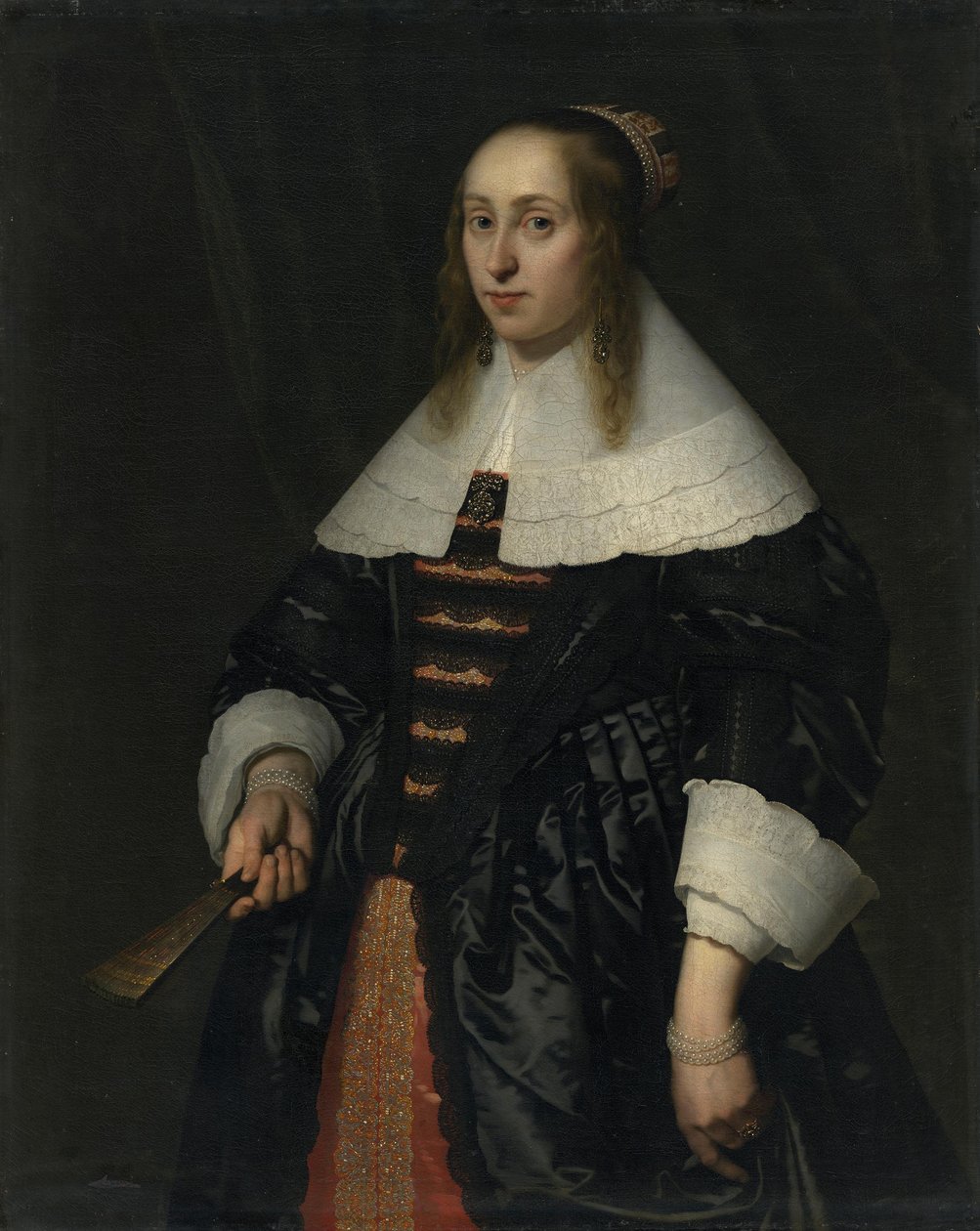 Portrett av en kvinne i svart satengkappe av Bartholomeus van der Helst