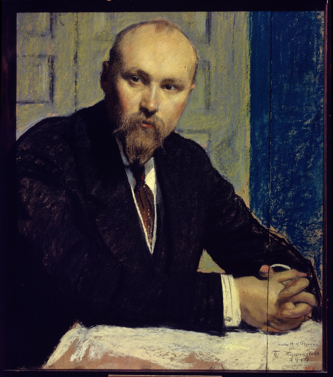 Portrett av kunstneren Nicolas Roerich (1874-1947) (Portrett av kunstneren N. Roerich). Verk av Boris Michaylovich Kustodiev (Koustodiev) (1878-1927), pastell på papp av Boris Mikhailovich Kustodiev