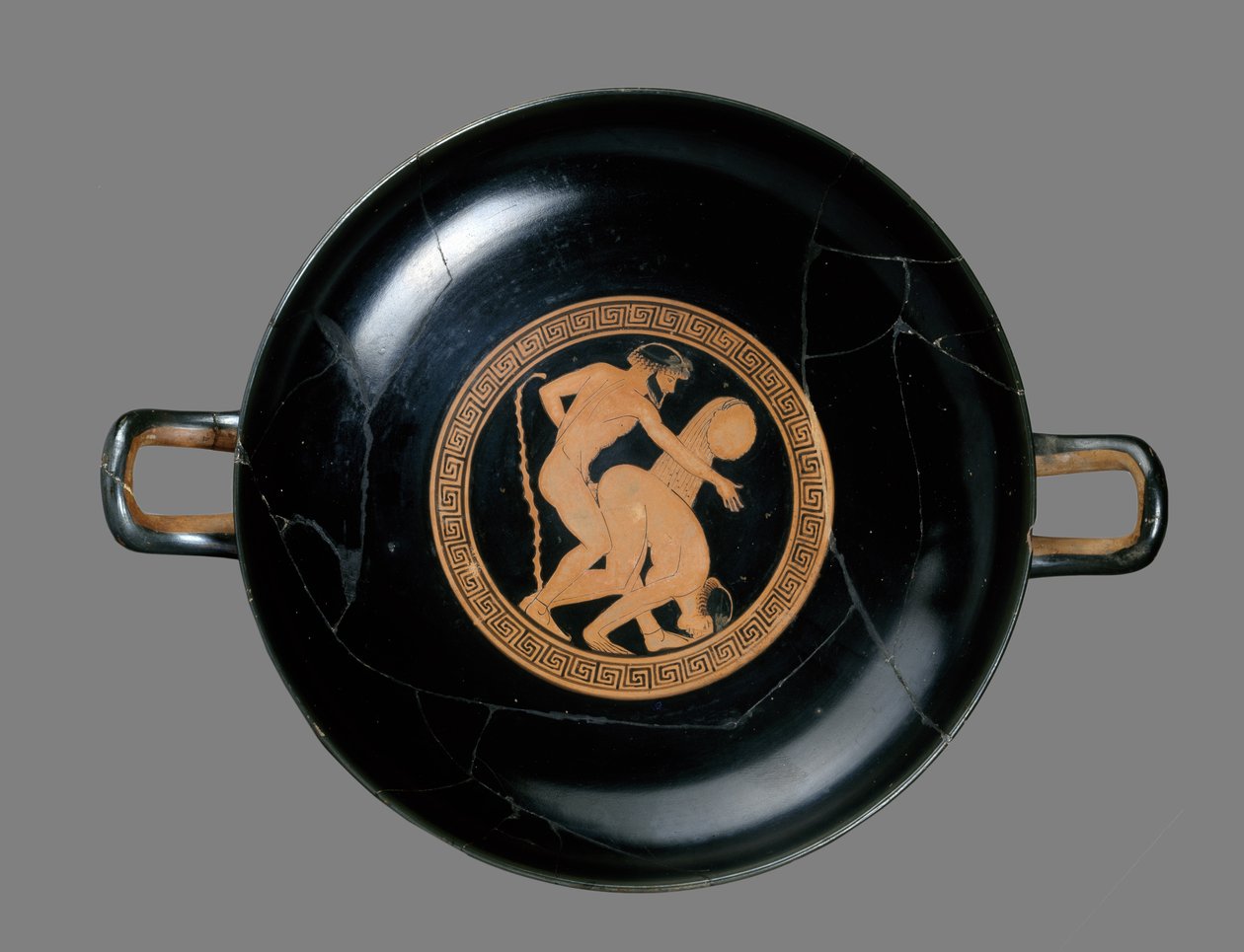Rødfigur kylix som viser en mann og kvinne som elsker (keramikk) av Briseis Painter