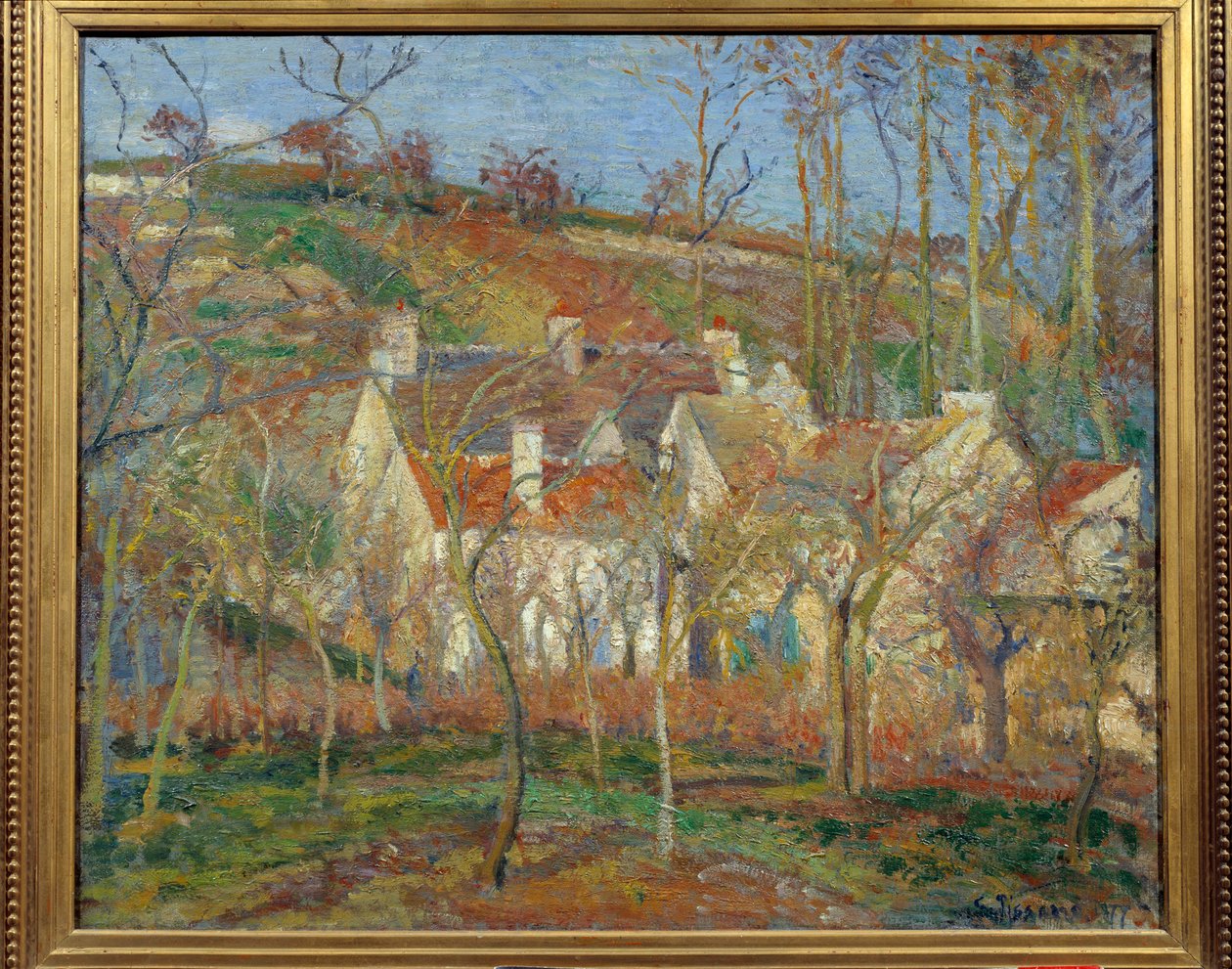 De røde takene, hjørnet av landsbyen, vinter av Camille Pissarro
