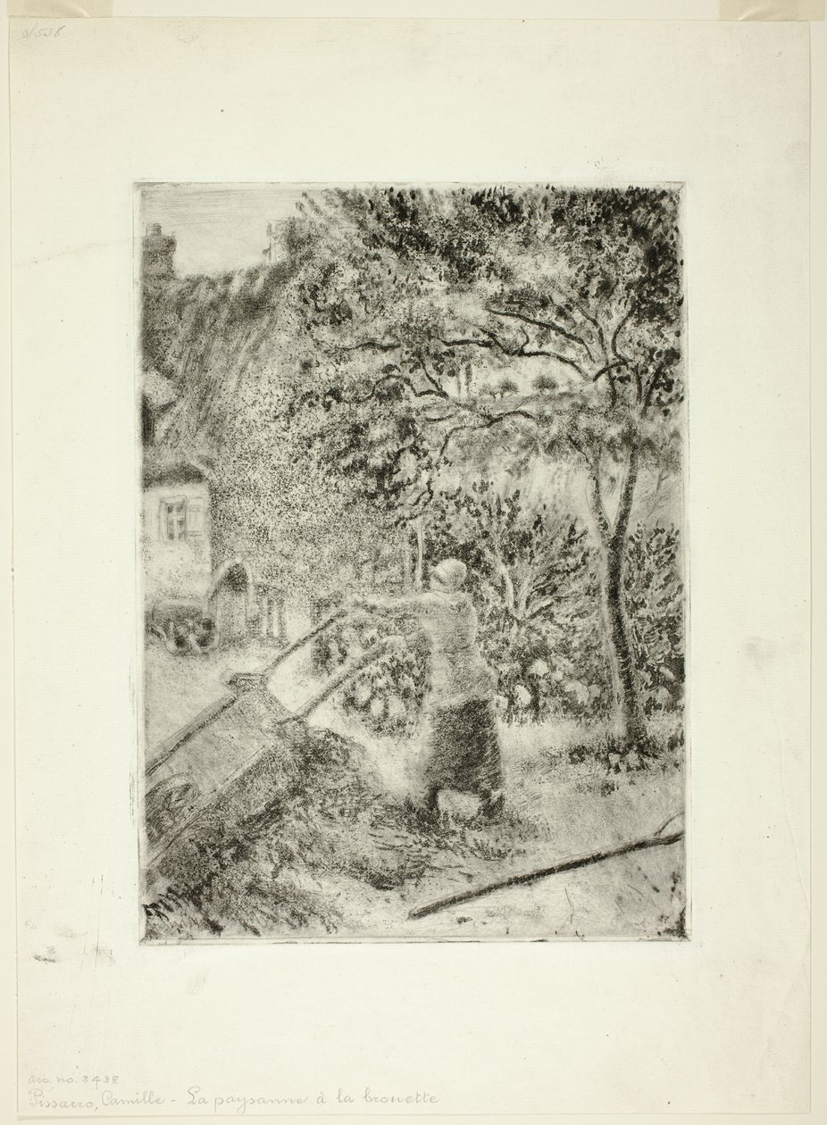 Kvinne som tømmer en trillebår av Camille Pissarro
