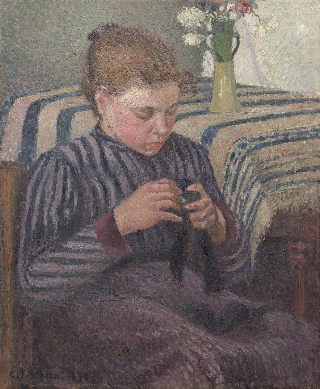 Kvinne reparerer av Camille Pissarro