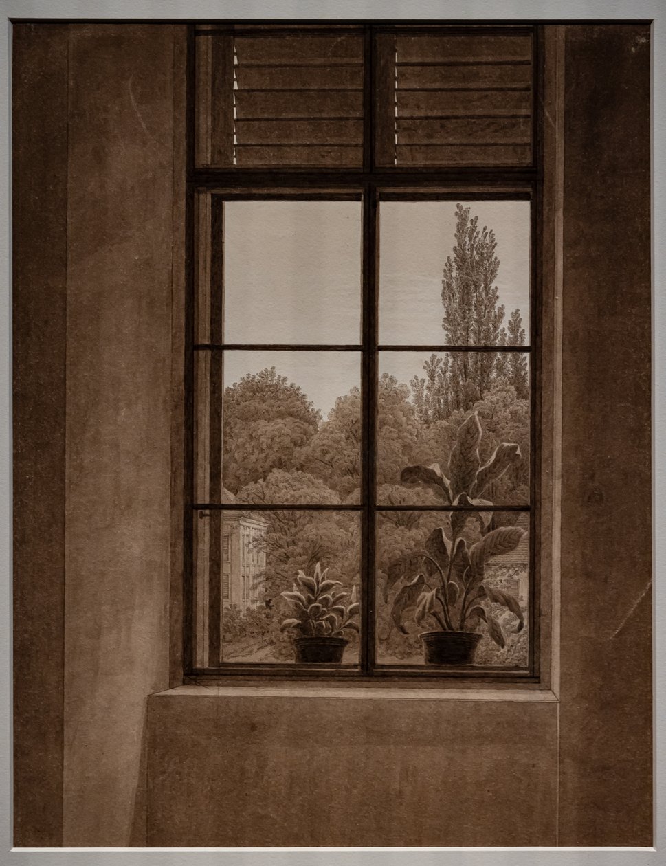 Vindu med utsikt over en park av Caspar David Friedrich