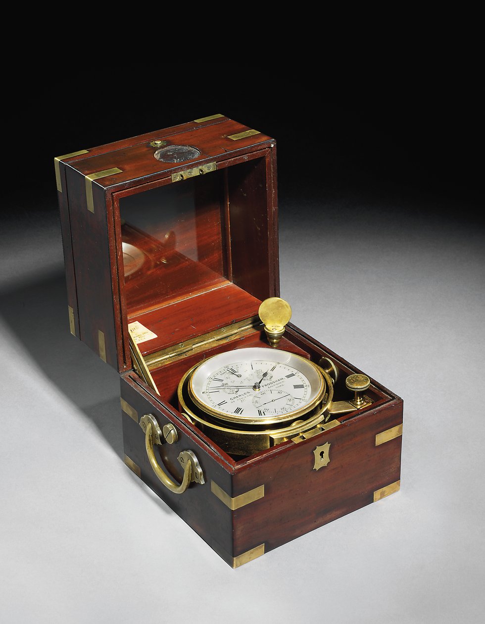 Et viktoriansk todagers marine kronometer med Hartnup balanse, ca. 1870 (montert i mahogni og messing) av Charles Frodsham