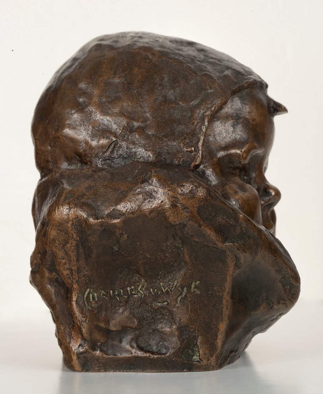 Baby med panser: The Artists Son (bronse) av Charles Henri Marie van Wijk