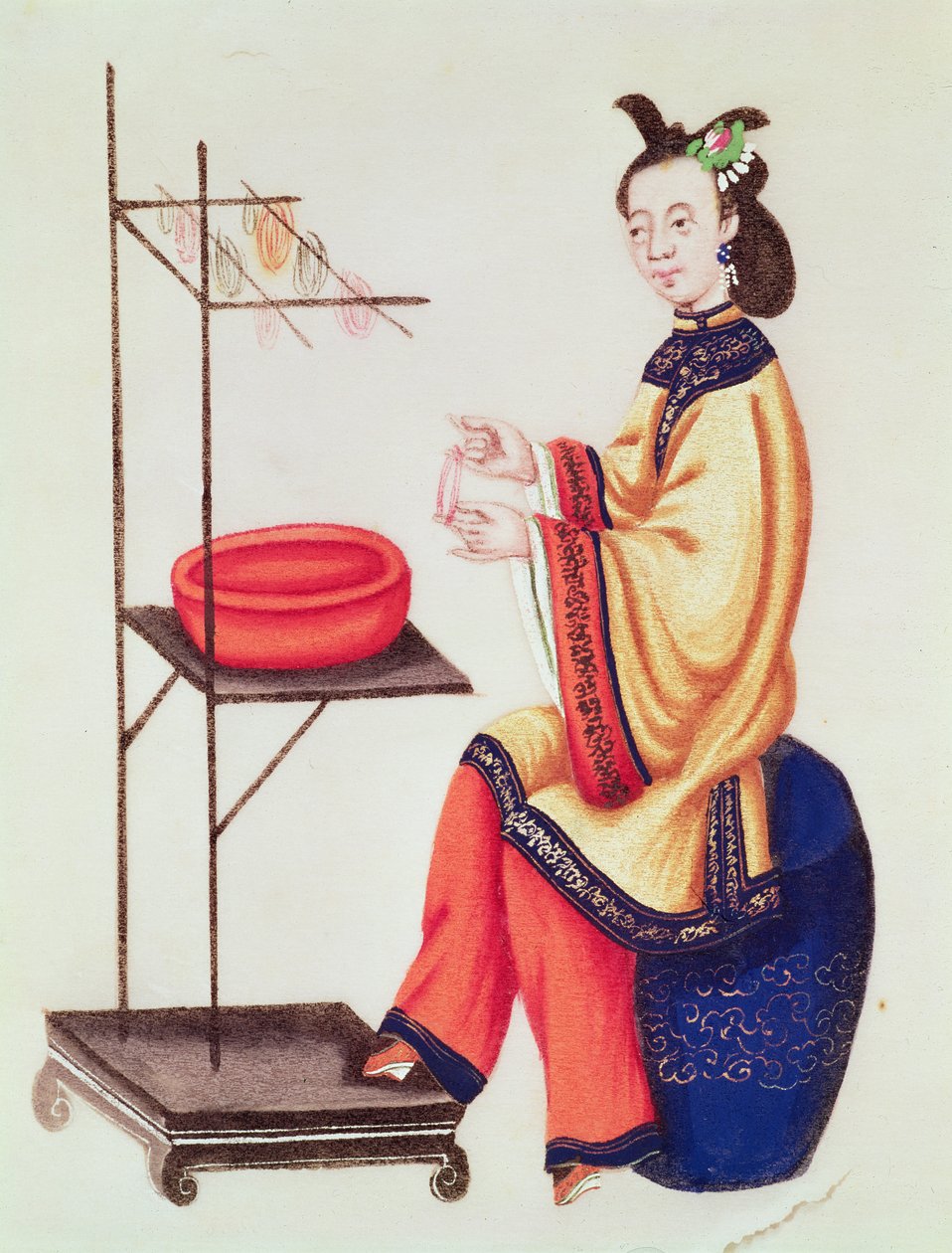 En kinesisk kvinne som lager en spole, Qianlong-perioden (1736–96) av Chinese School