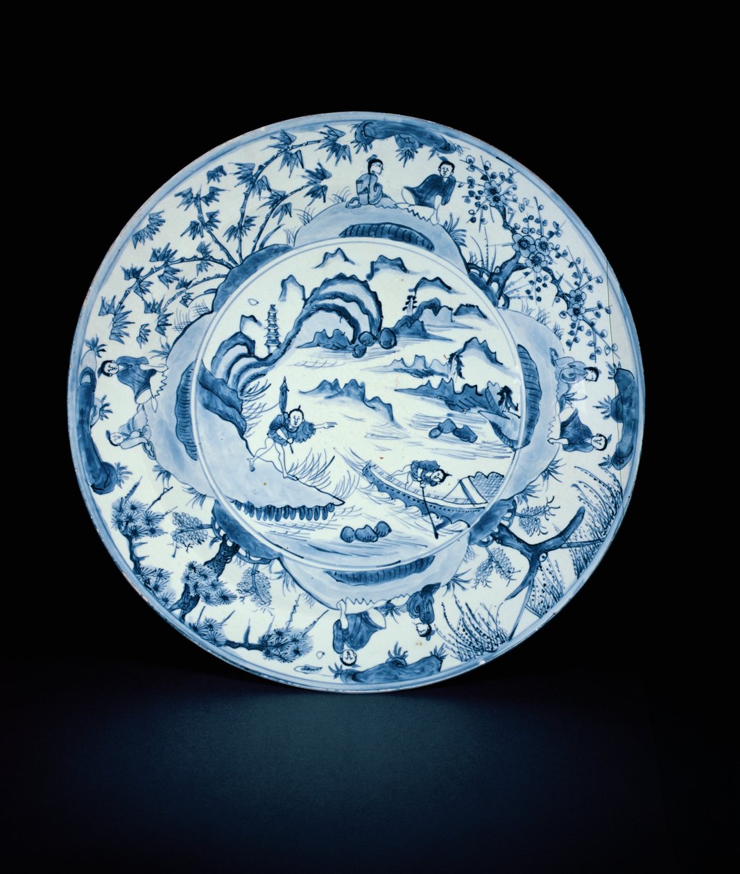 Blått og hvitt fat malt med fiskere i en elvescene, Tianqi eller Chongzheng, 1620-30 (porselen) av Chinese School