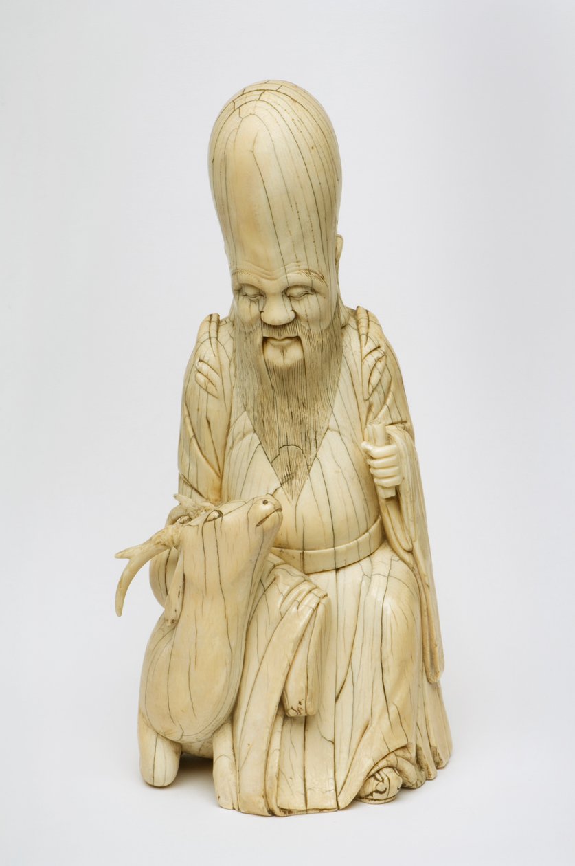 Utskåret elfenbensfigur av Shou Xing sittende med hjort, ca. 1580-1644 av Chinese School