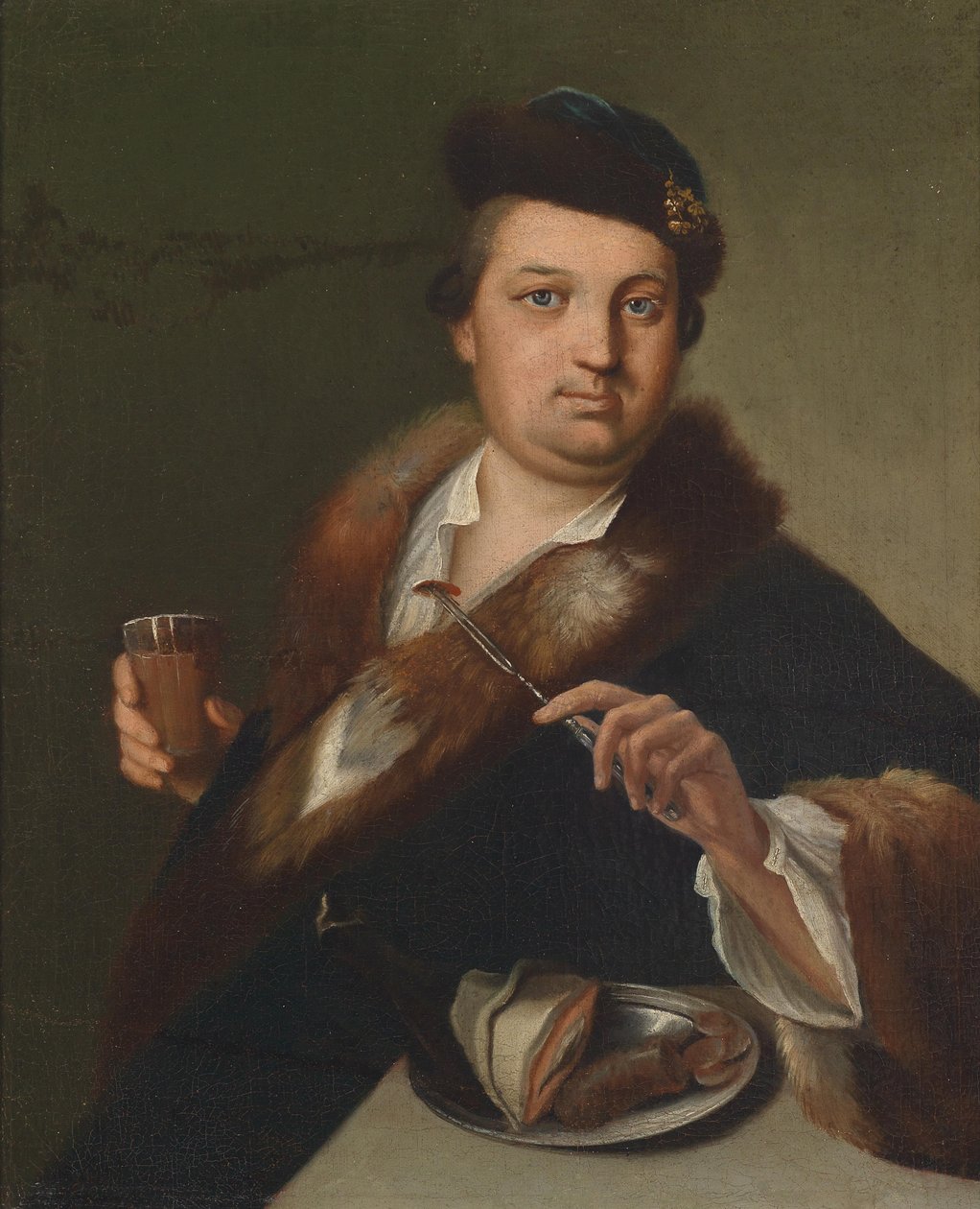 En mann som spiser et måltid av Circle of Jan Kupecký