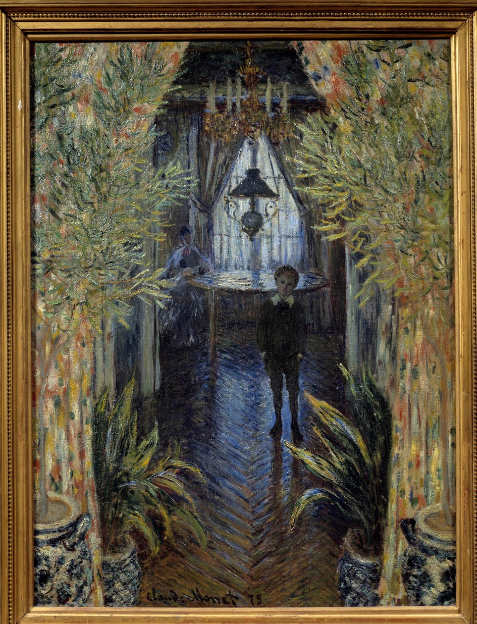 Et leilighetshjørne Innvendig utsikt med sønnen (Jean) og kona (Camille Doncieux) til kunstneren av leiligheten i Argenteuil. Maleri av Claude Monet (1840-1826). 1875 søn. 0,8x0,6 m Paris, Musee d
