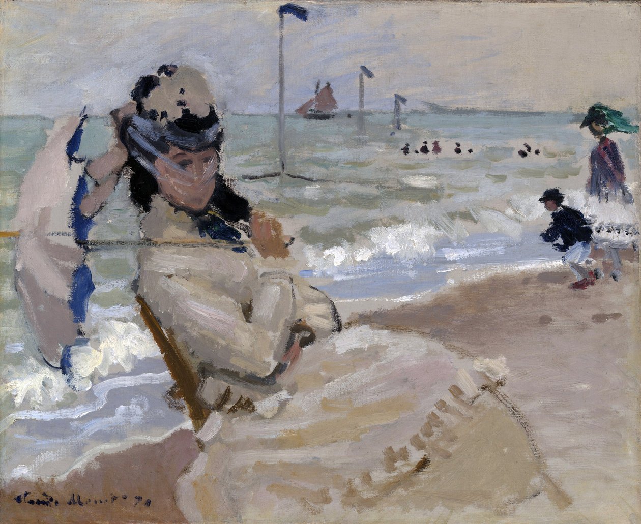 Camille på stranden i Trouville av Claude Monet