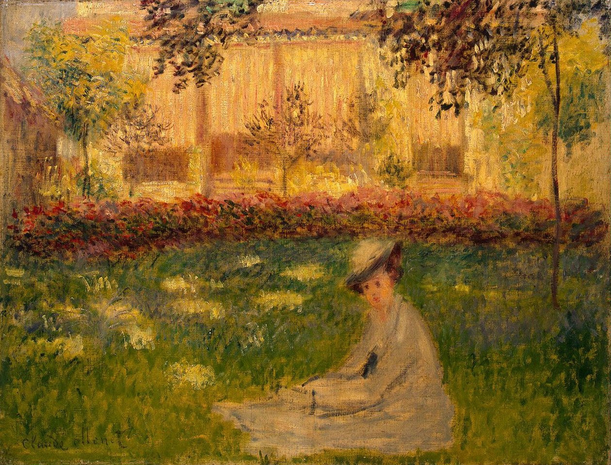 Kvinne i en hage av Claude Monet