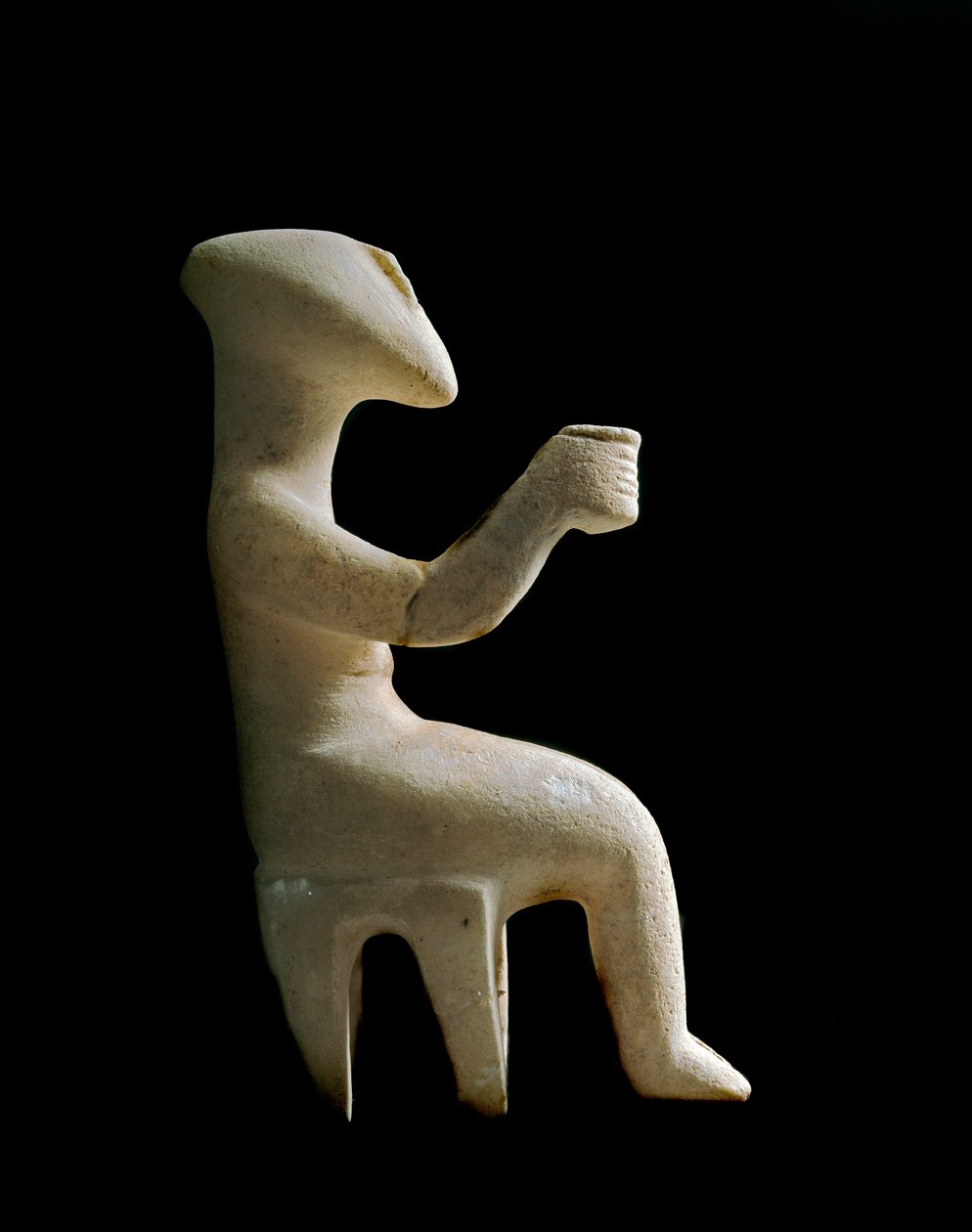 Kykladenes kunst: "" figur som sitter på en krakk""" Marmoridol innlagt med oker. Kykladisk sivilisasjon (-3200 a -2000) Søn. 15,2 cm Athen, Nasjonalt arkeologisk museum (inv. 3910) av Cycladic Cycladic