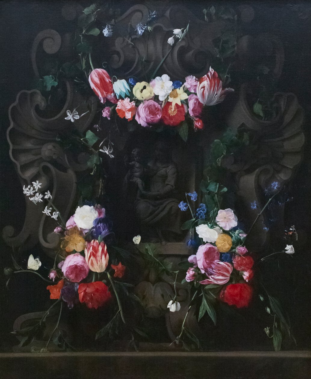 Kranser av blomster rundt Jomfruen med barn av D. & Quellinus E. (1607 78) Seghers