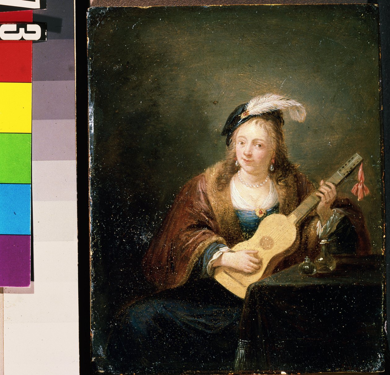Kvinne med gitar. Maleri av David Teniers den yngre (1610-1690). Olje på tre av David Teniers the Younger