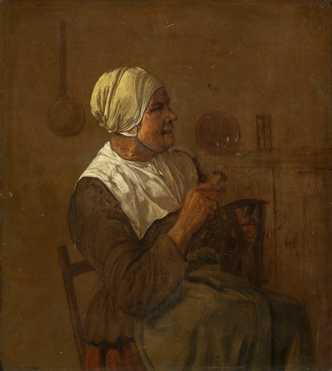 En gammel kvinne sittende, ca. 1650-1700 (olje på panel) av Dutch School