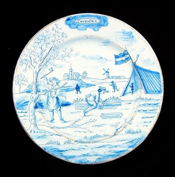 Delftvareplate som viser desember måned (tinnglasert lertøy) av Dutch School