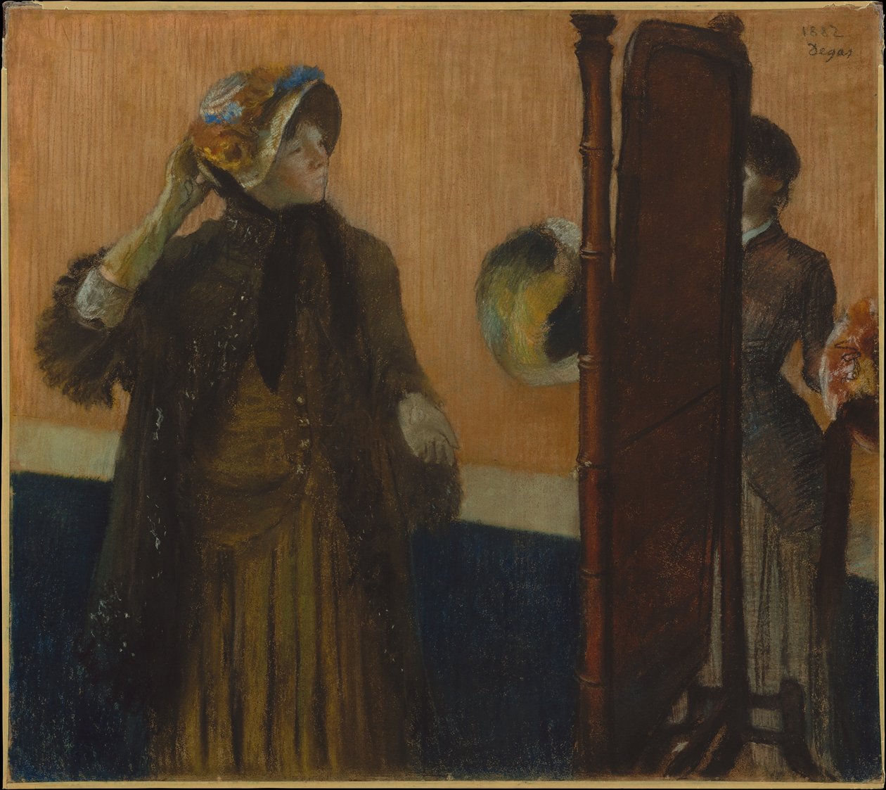 Hos hattehandleren av Edgar Degas