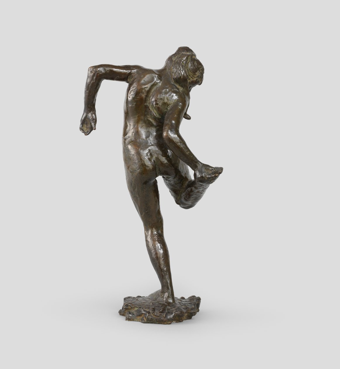 Danser ser på den høyre fotsålen, 1895-1902 av Edgar Degas