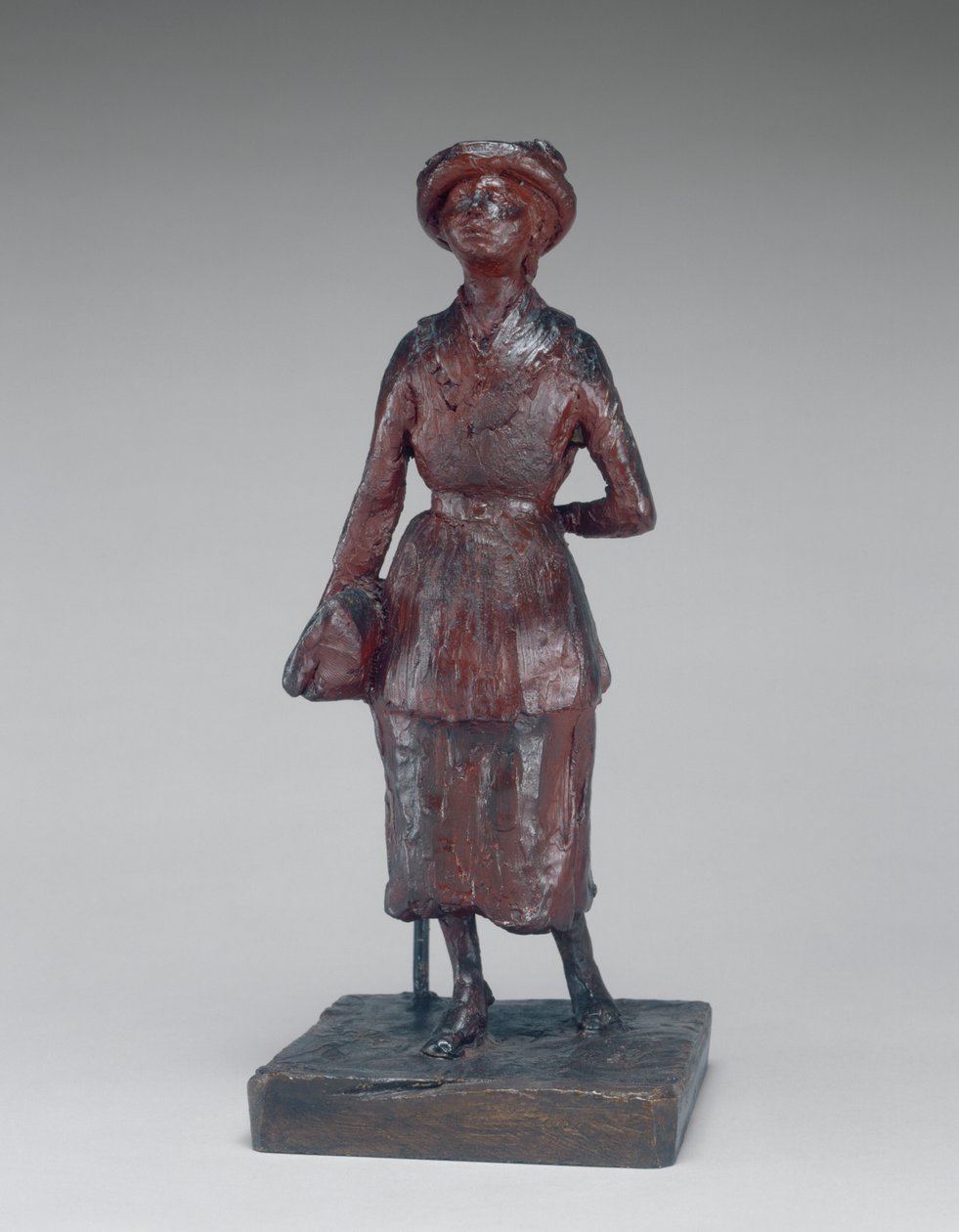 Skolepikekvinnen som går i gaten, ca. 18801881. av Edgar Degas