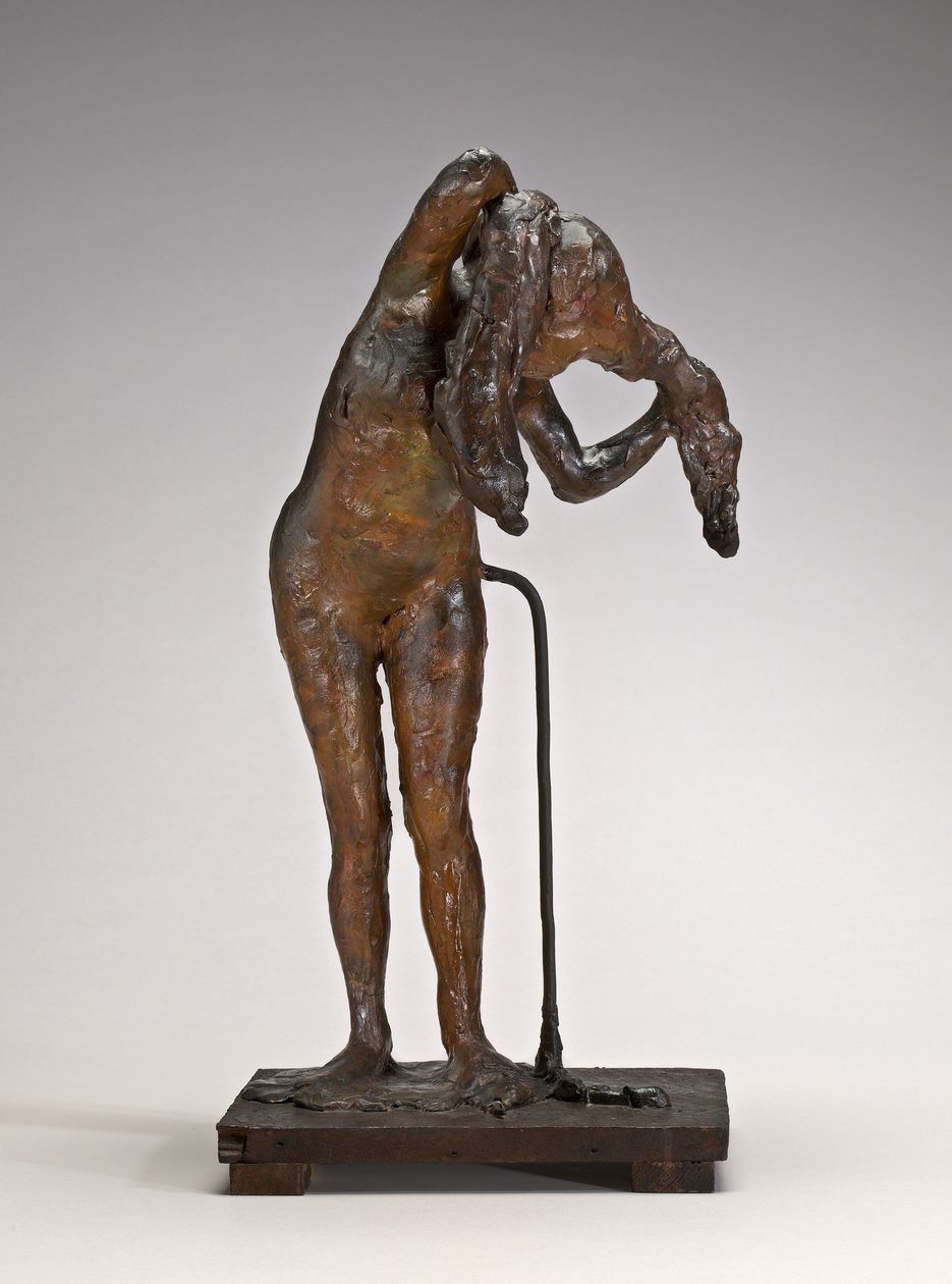 Kvinne som ordner håret hennes, muligens sent på 1880-1890-tallet. av Edgar Degas