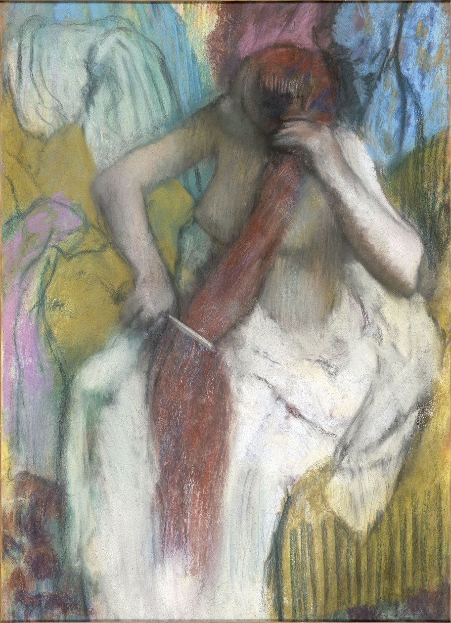 Kvinne som kjemmer håret av Edgar Degas