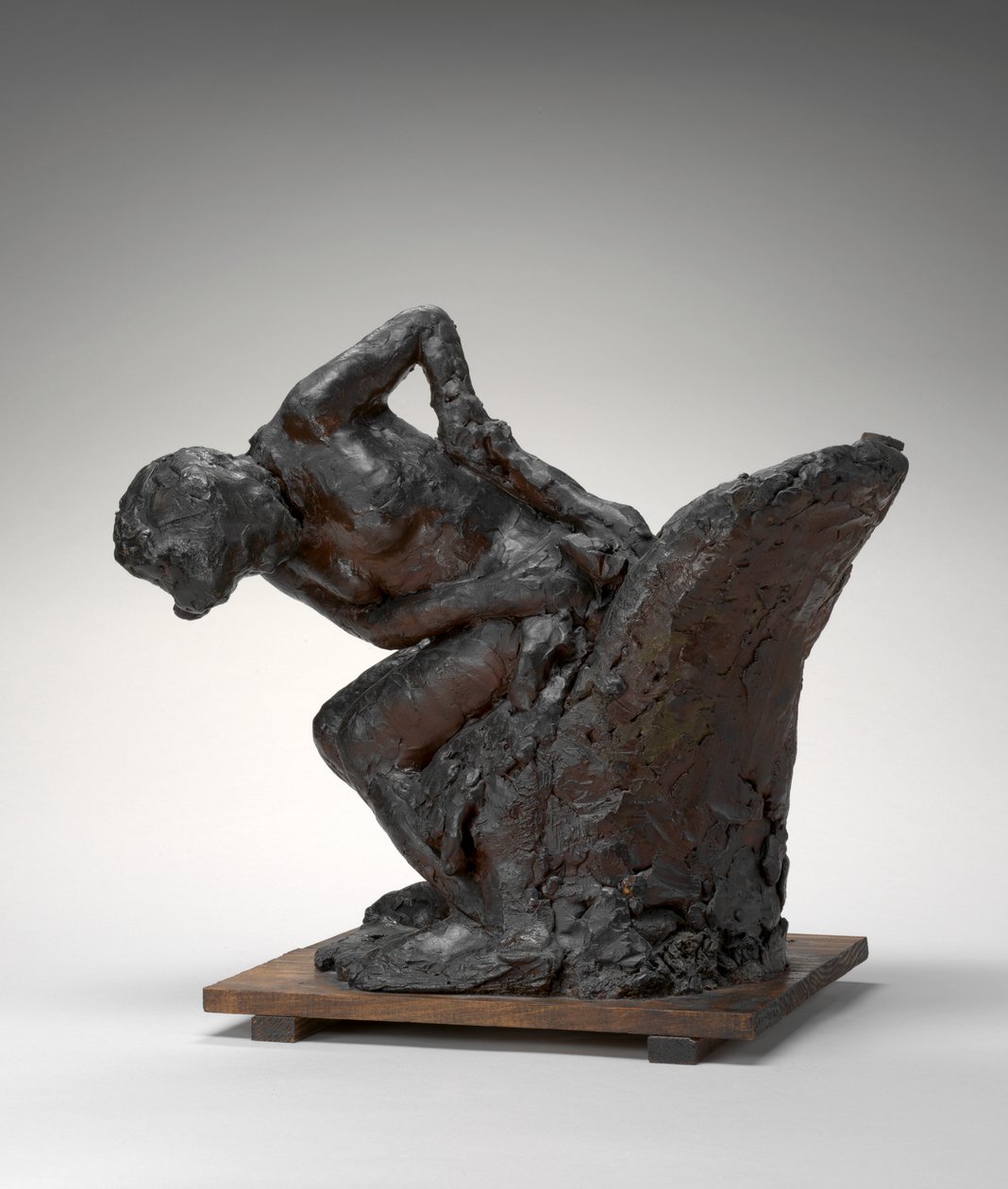 Kvinne sitter, tørker av venstre hofte av Edgar Degas