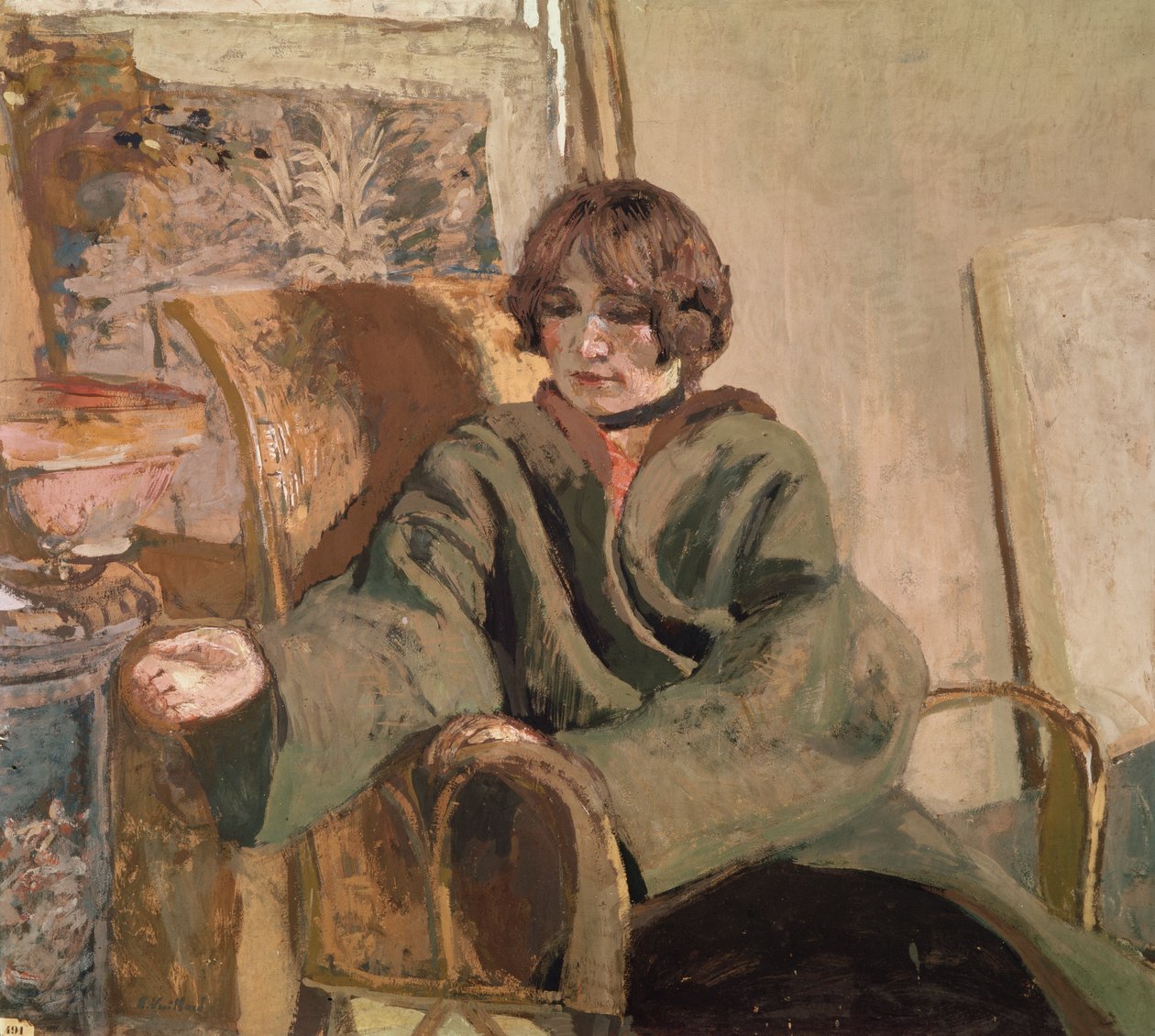 Kvinne som sitter ved siden av en komfyr av Edouard Vuillard
