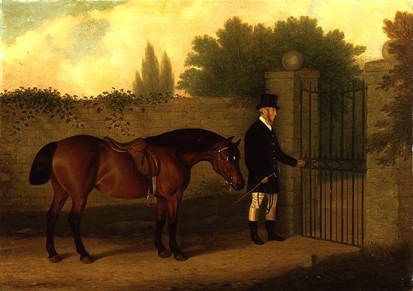 En gentleman som leder en walisisk kolbe ved en hageport av Edward Tolley